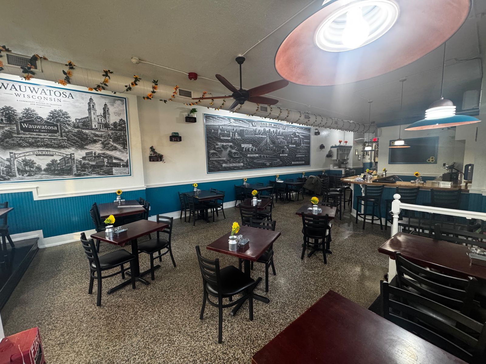 Dining room with Mexico City and Wauwatosa murals